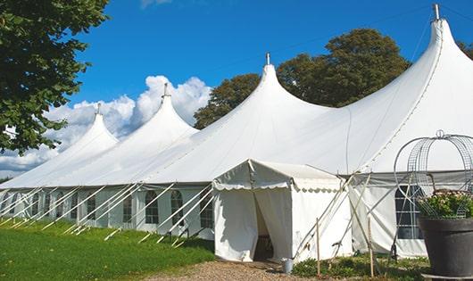 a line of sleek and modern portable toilets ready for use at an upscale corporate event in Milford CT